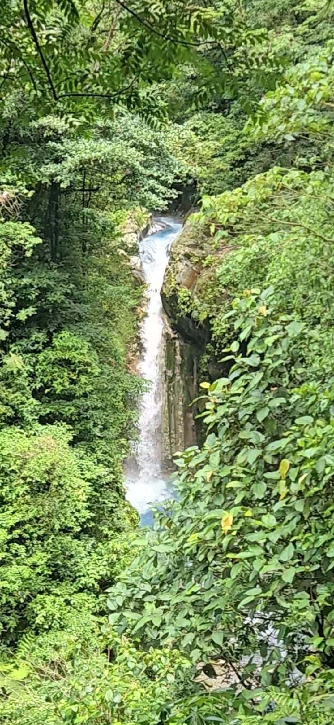 Ice blue colored waterfall 