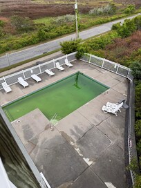 Both pools were green and dirty.