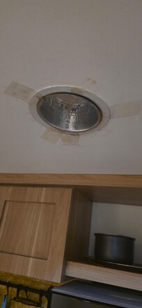 Light held in by tape