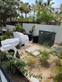 View from the room. Constant loud AC unit. Also constant smell of beans and onions