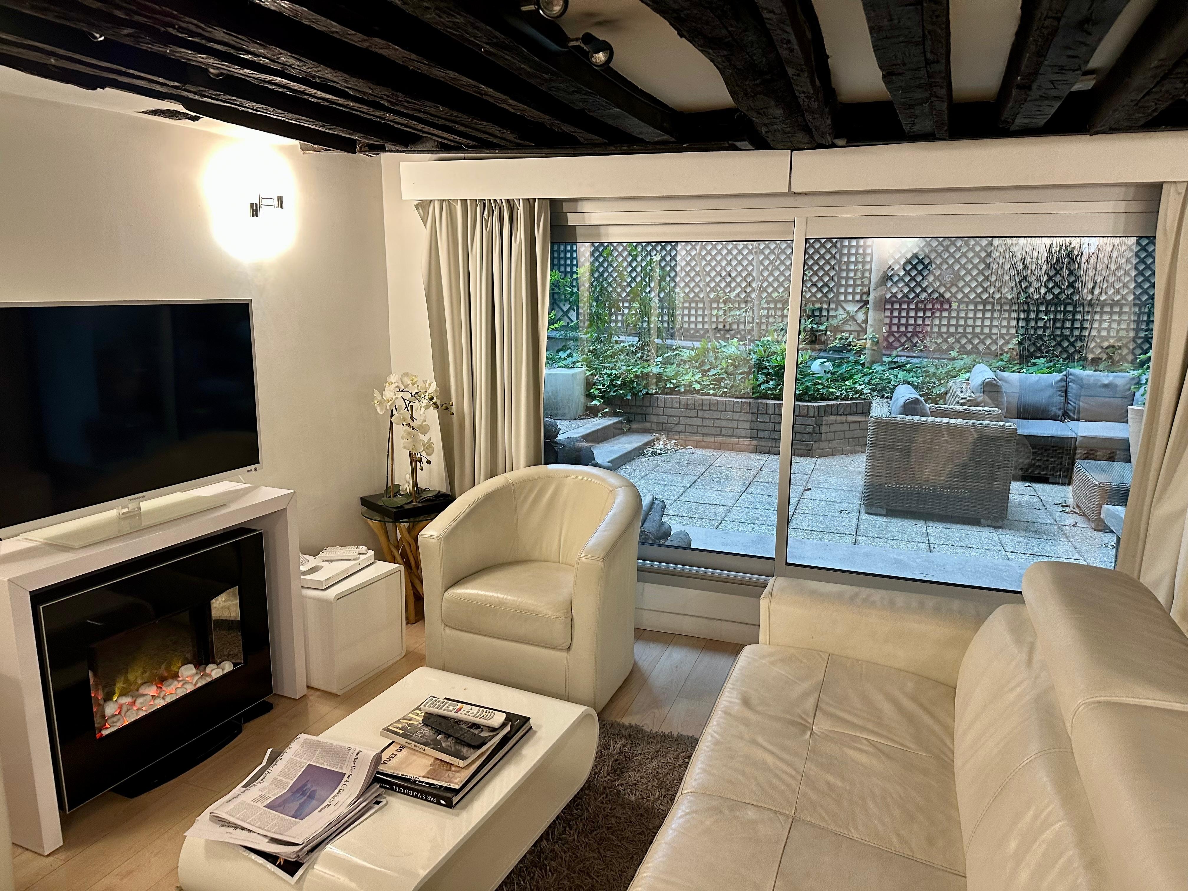 The living room looking out to the terrace