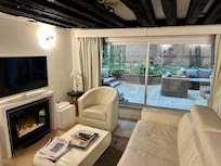 The living room looking out to the terrace