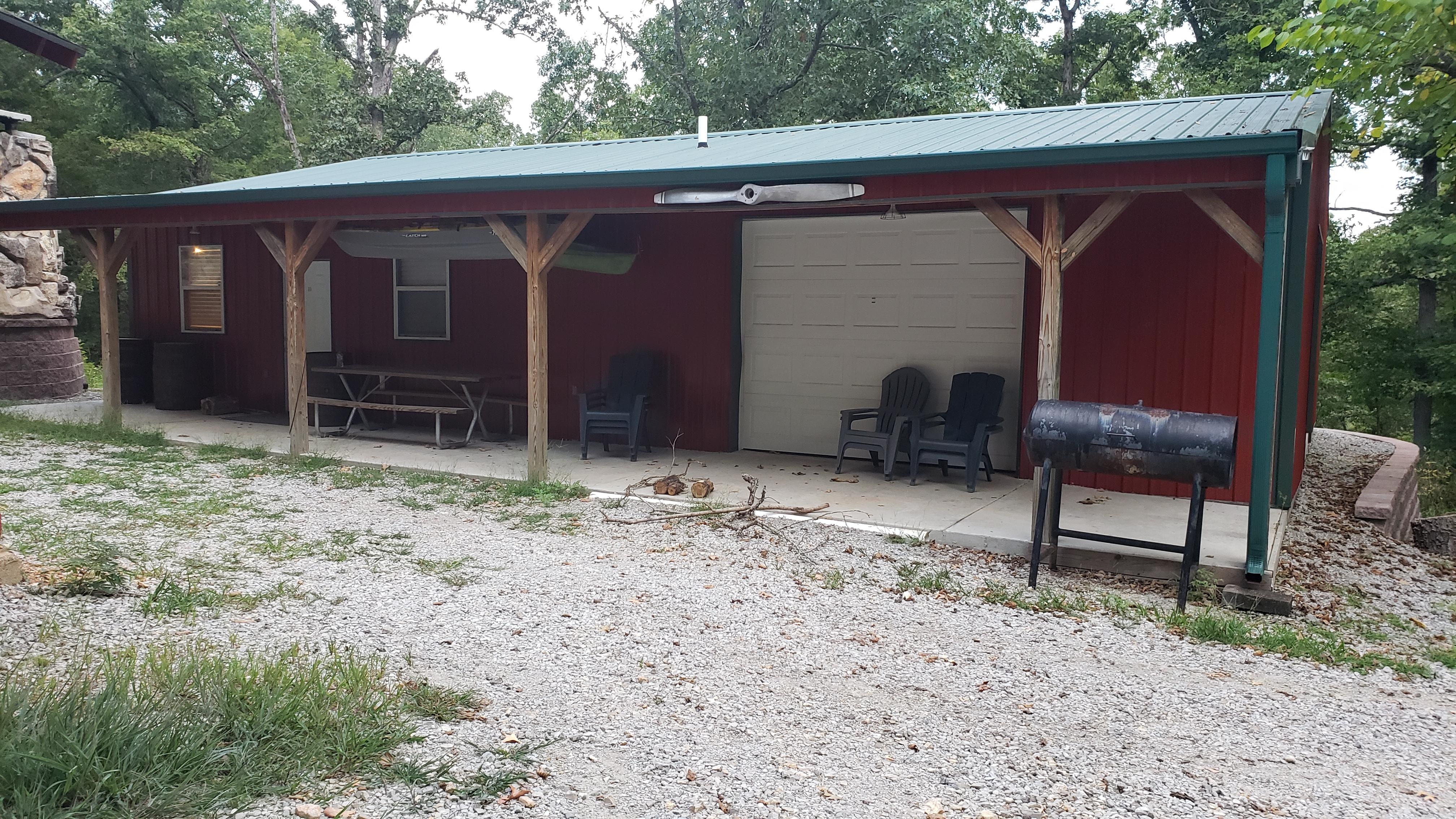 This is your place with a rusted grill and portable fire pit.