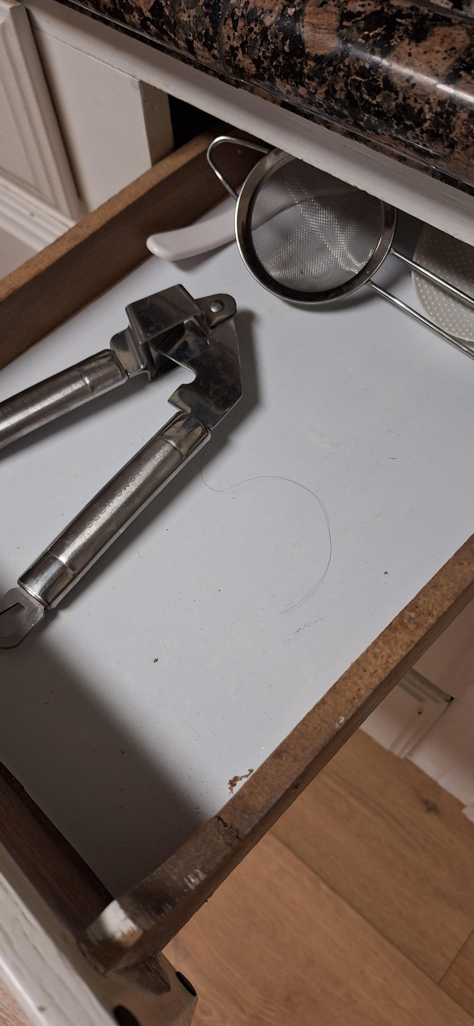 Hair and dirt in drawers.
