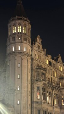 Our room was the one with tall lighted windows at the top of the tower and the level below.