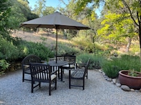 Charming garden dining area.