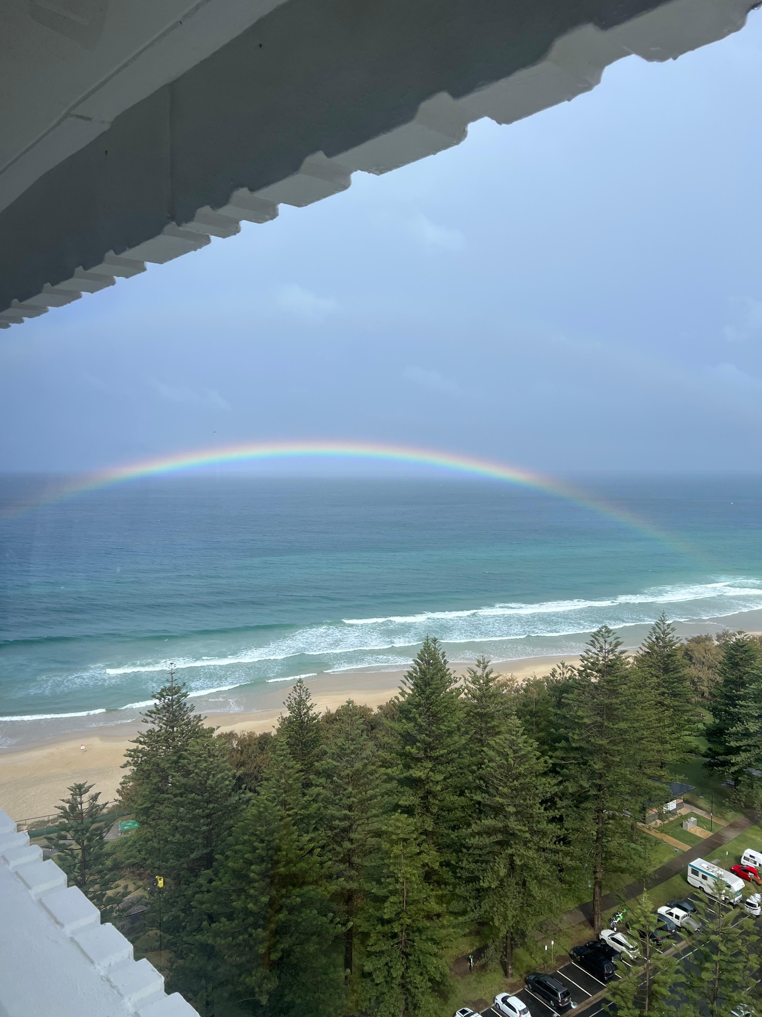 View from the kitchen window of the beach and yess the rainbow is real! 