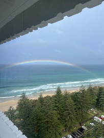 View from the kitchen window of the beach and yess the rainbow is real!
