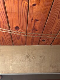Dust buildup on wire running above kitchen table
