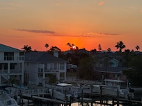 View from balcony of a sunrise.