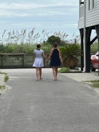 Me and my granddaughter walking to the beach