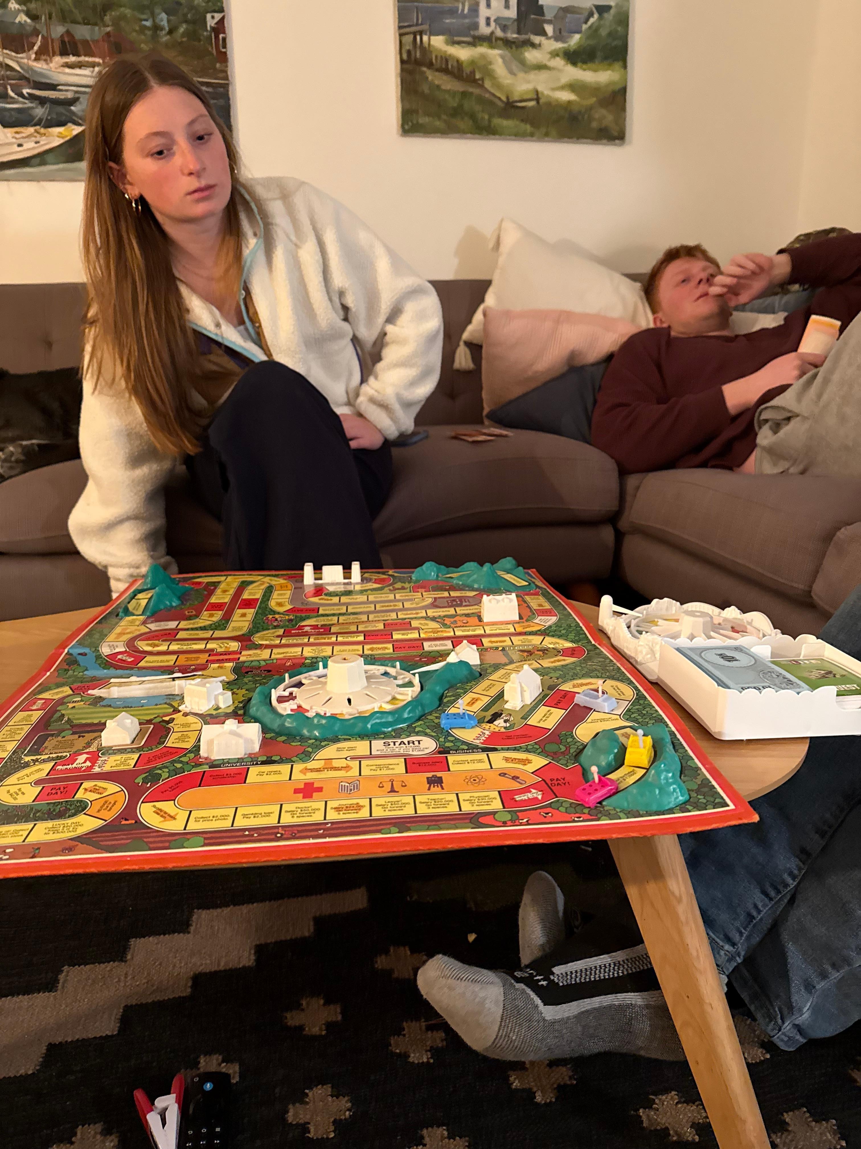 Hanging out playing board games in one of the living rooms