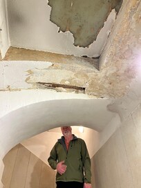 Ceiling falling down and very low. Easy to hit your head