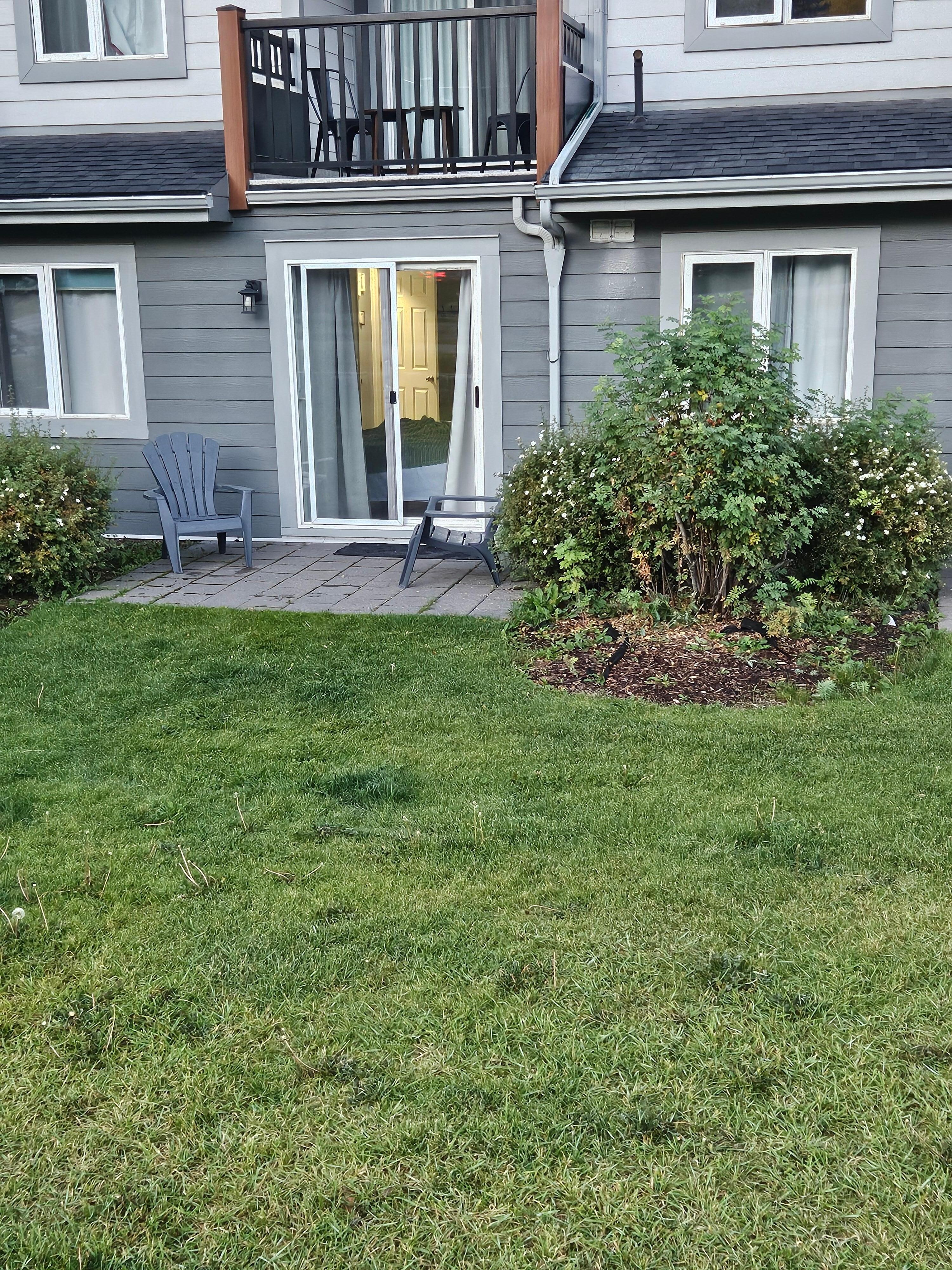 Patio door to outside from one bedroom.