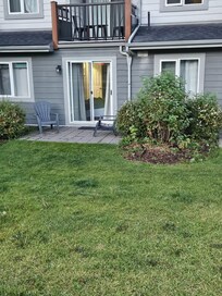 Patio door to outside from one bedroom.