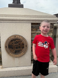 My son so happy at Disney Springs