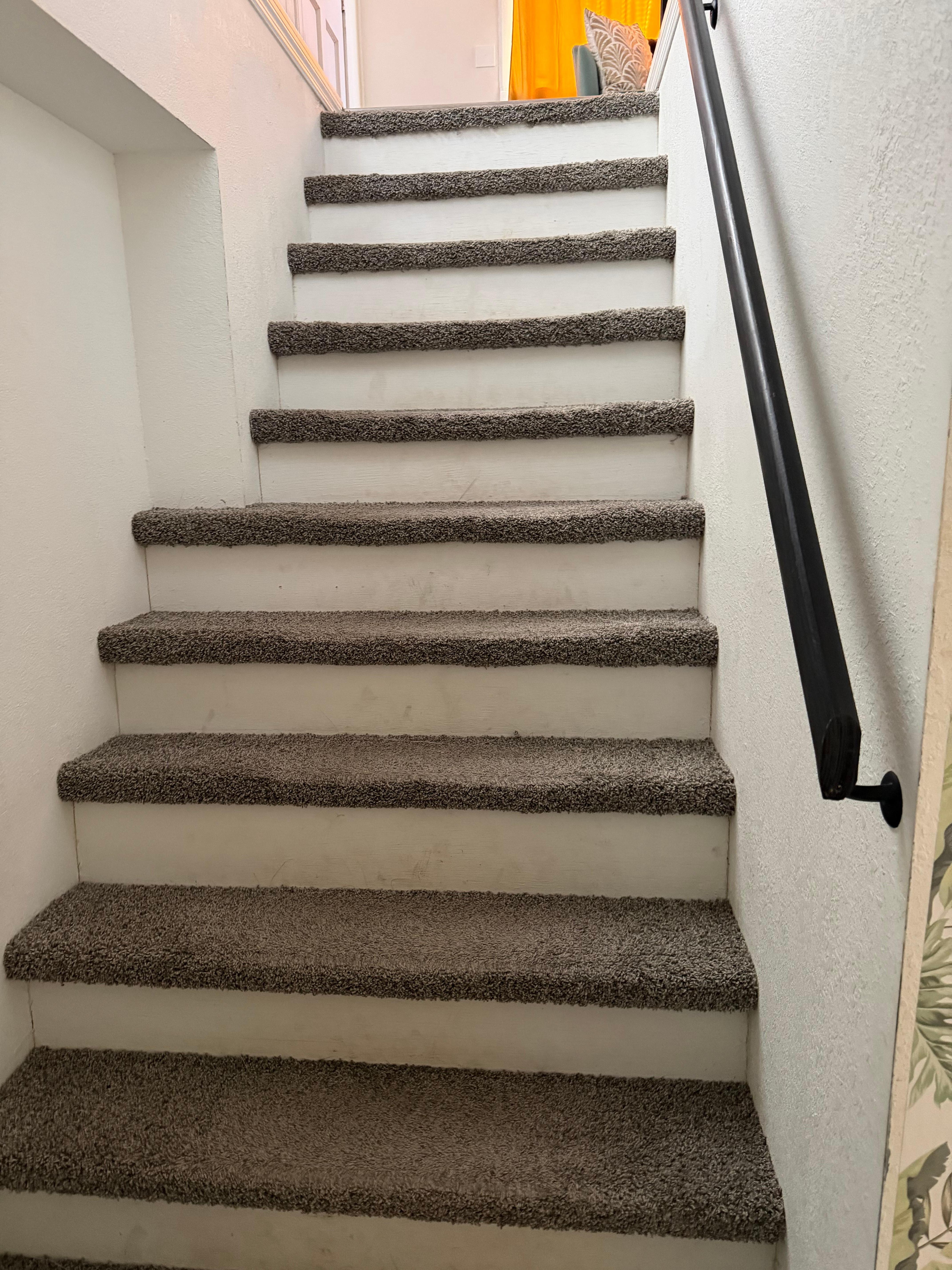 The incline of the stairs is very steep with narrow steps.