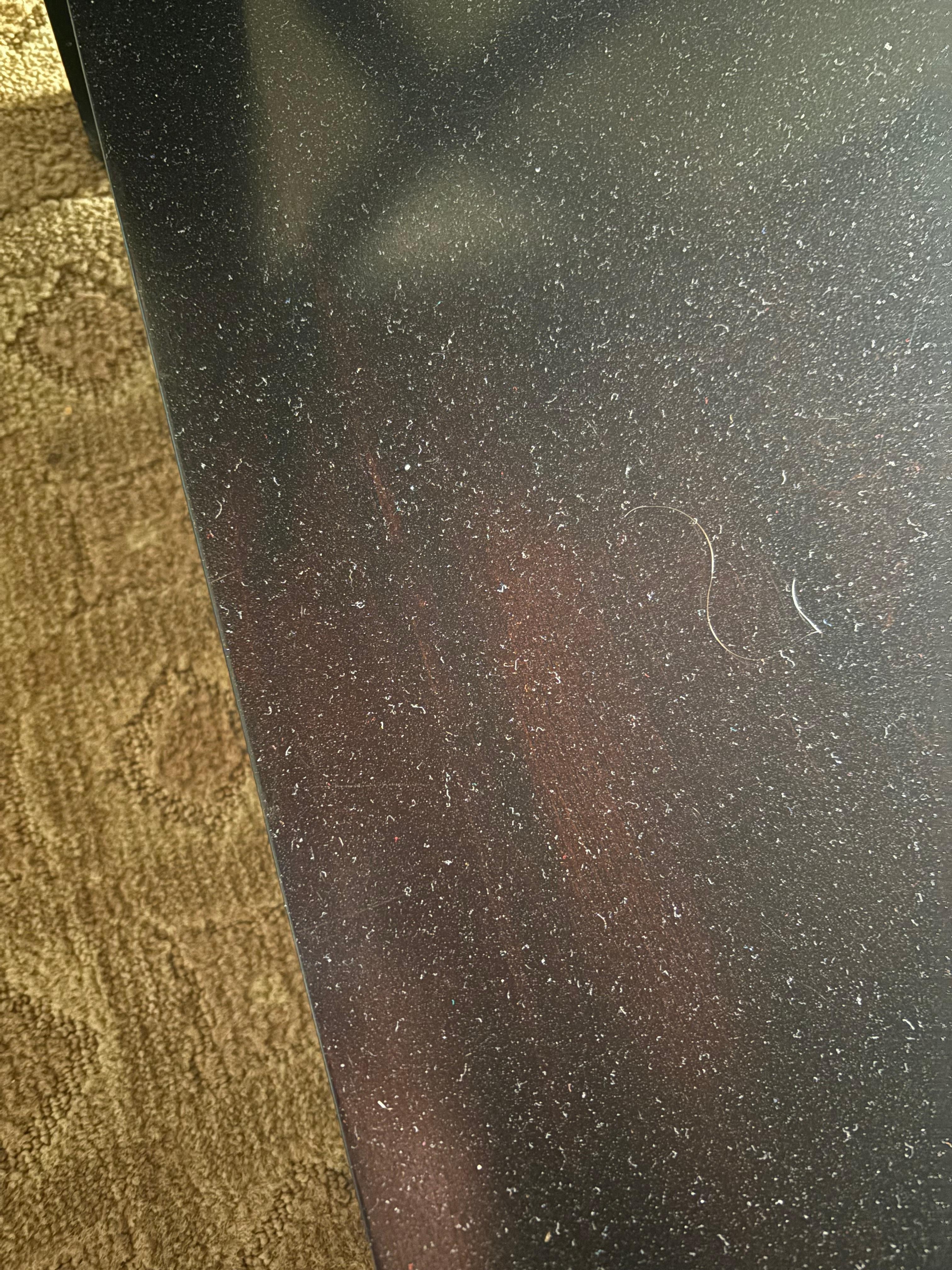 Dust and hair on coffee table