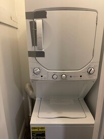 Washer Dryer out of order. Dryer taped shut.