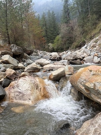 The river right beneath the hotel after a little trek down