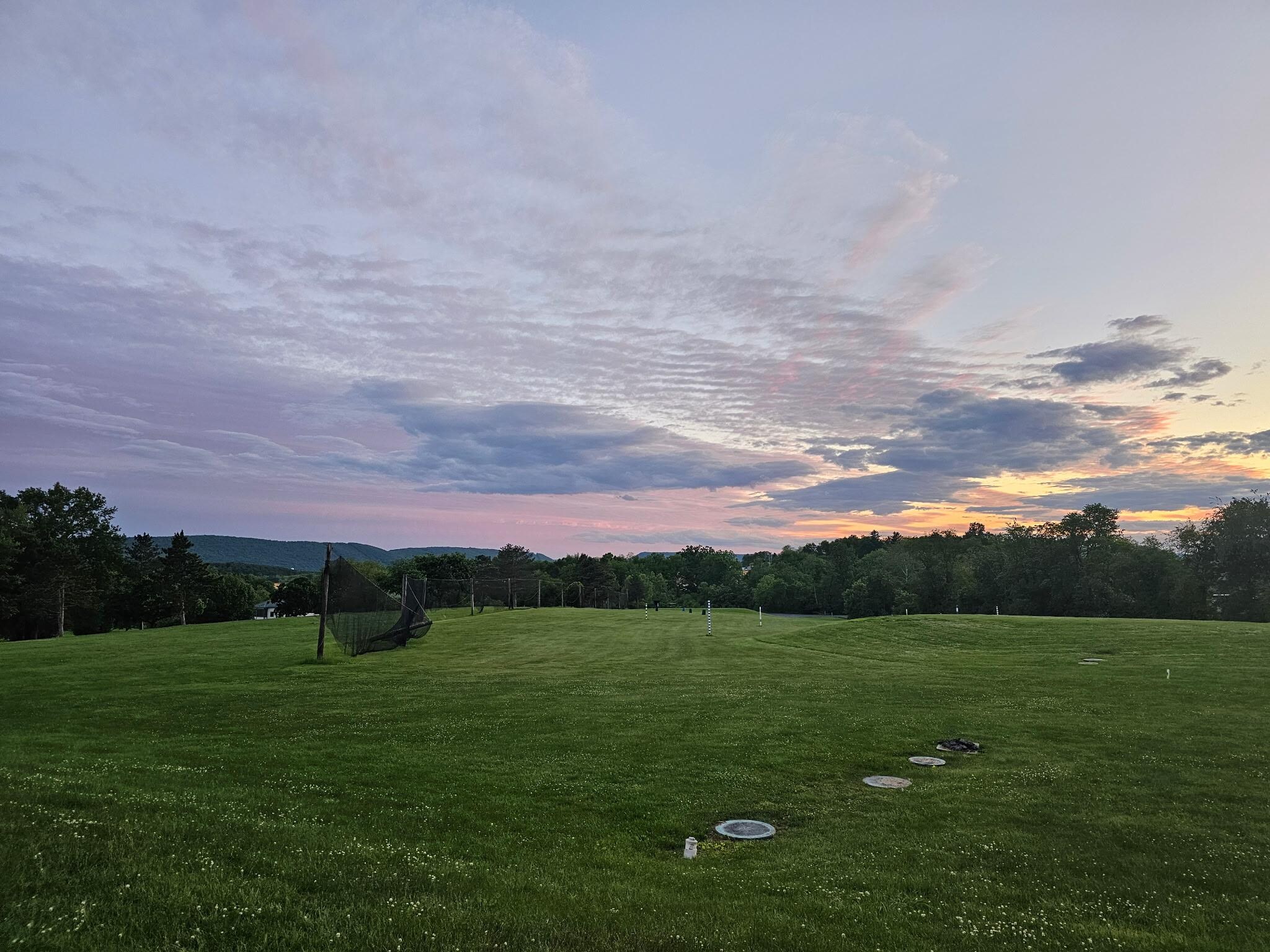 Beautiful sunset from our room out over the golf course. 