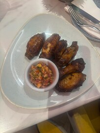 Wings with mango salsa