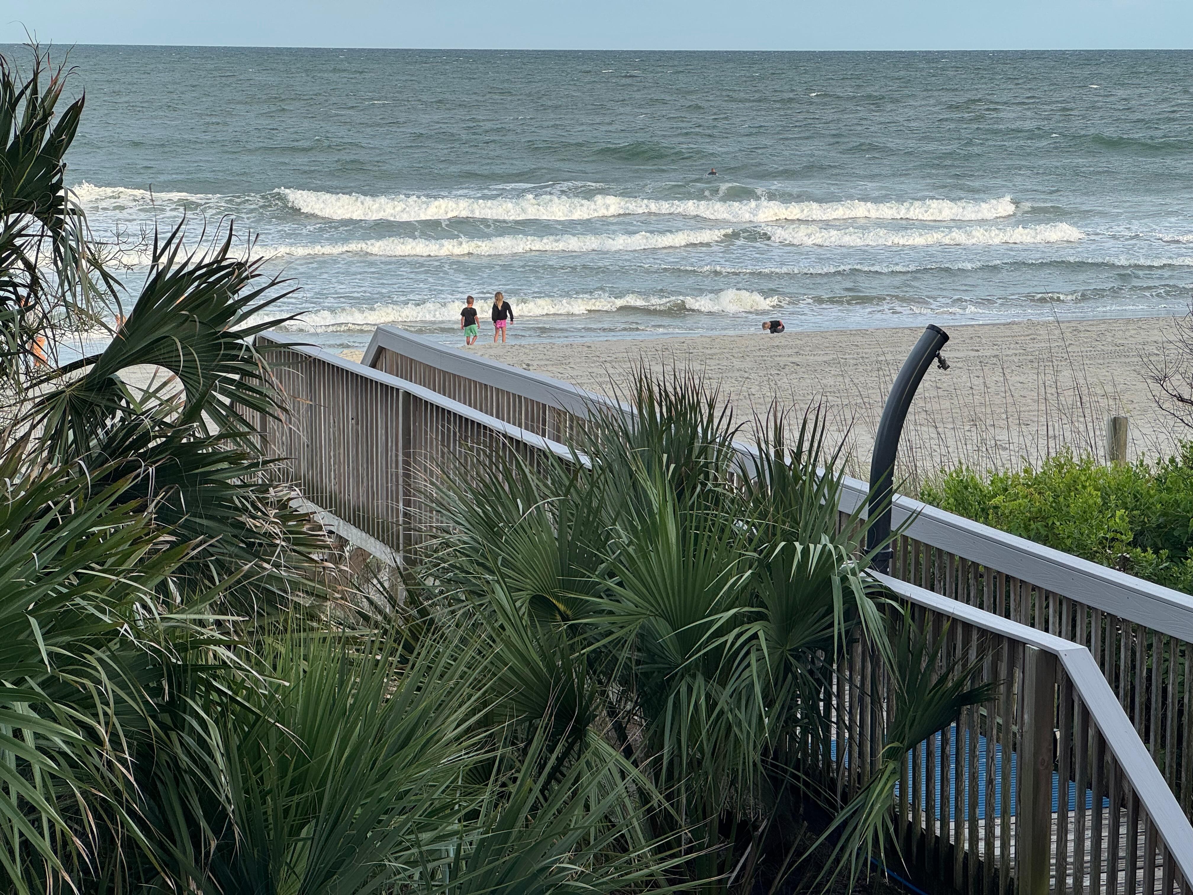 Boardwalk from condo to beach.