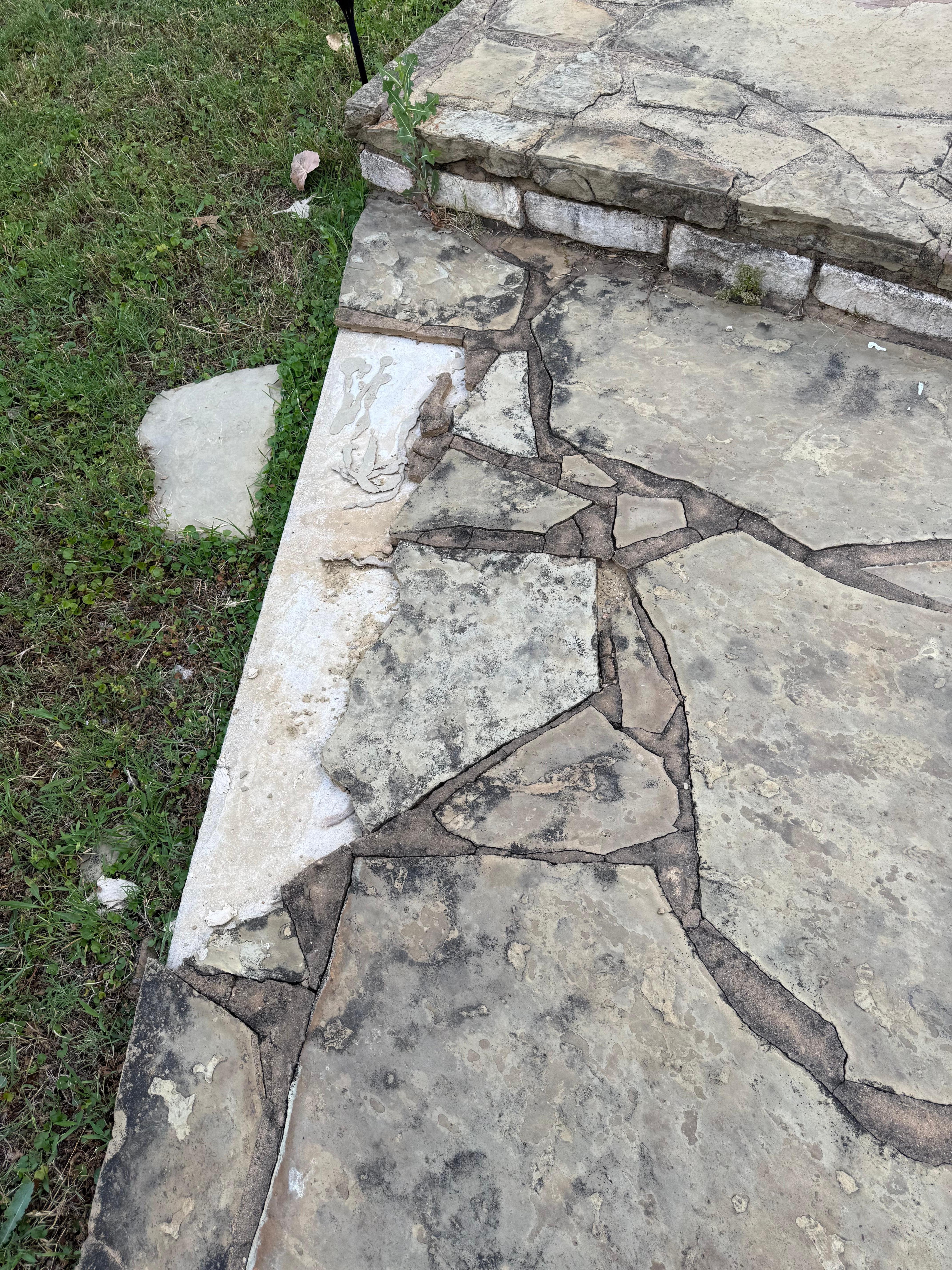Cracked stone leading to pool