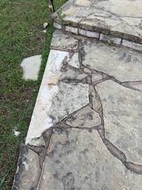 Cracked stone leading to pool