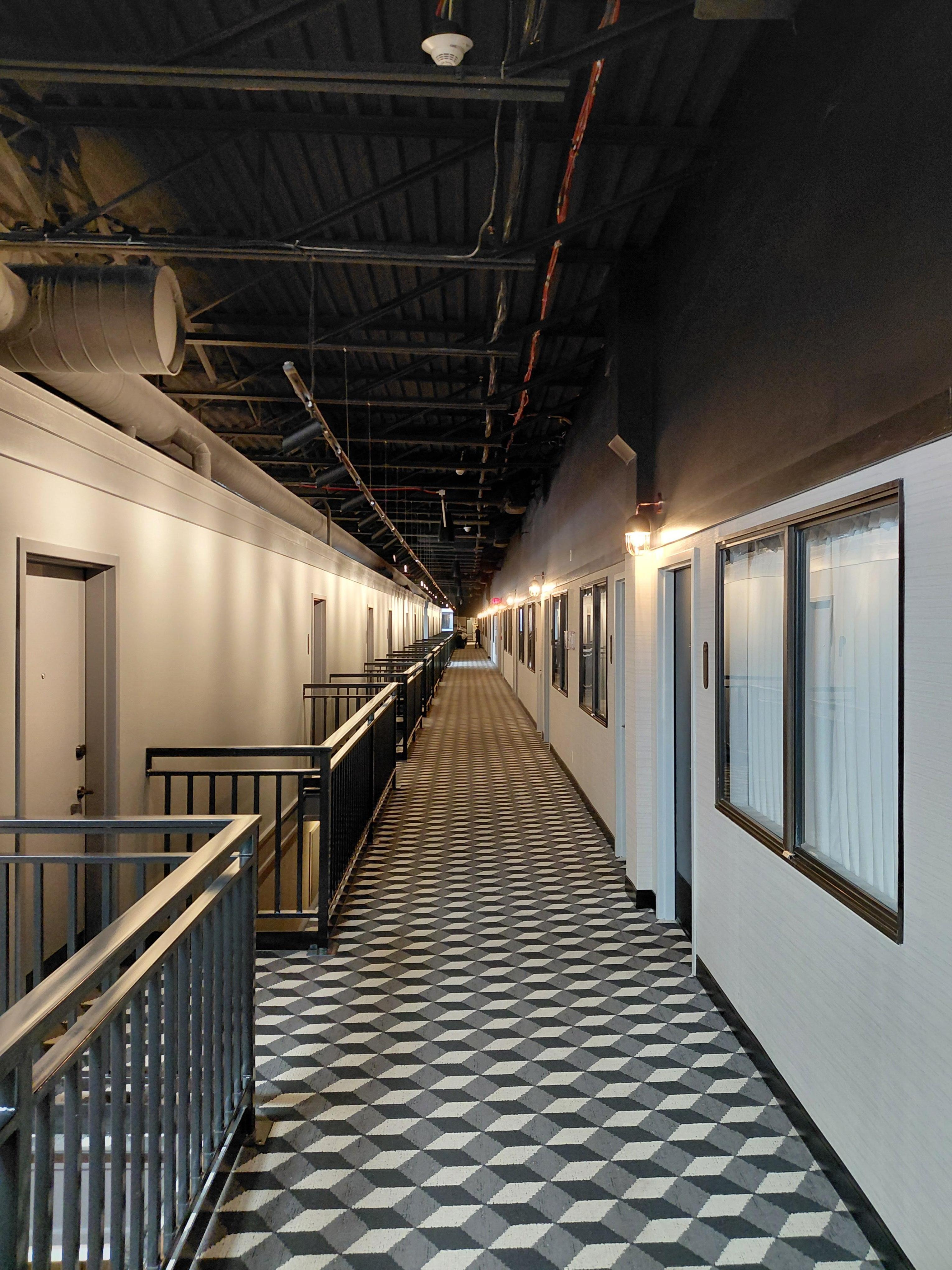 Hallway. The carpet makes it look like a MC Escher drawing. 