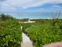 Steps to the beach from Villa #5.