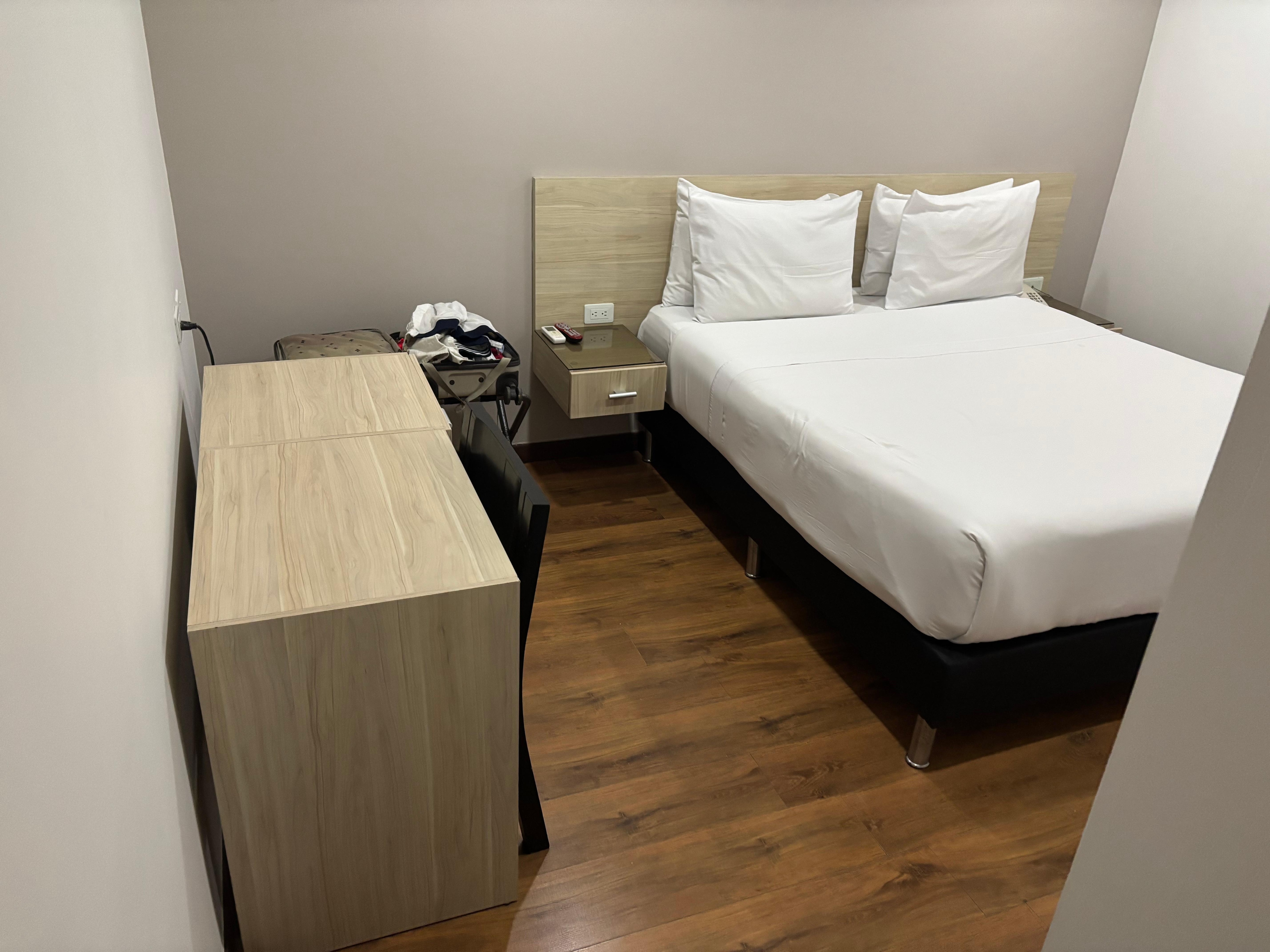 Room with mini fridge , desk, chair … but no safe.