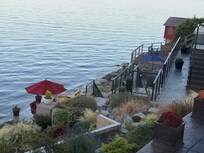 The area beneath the cabin- there is plentiful seating and a covered swing.