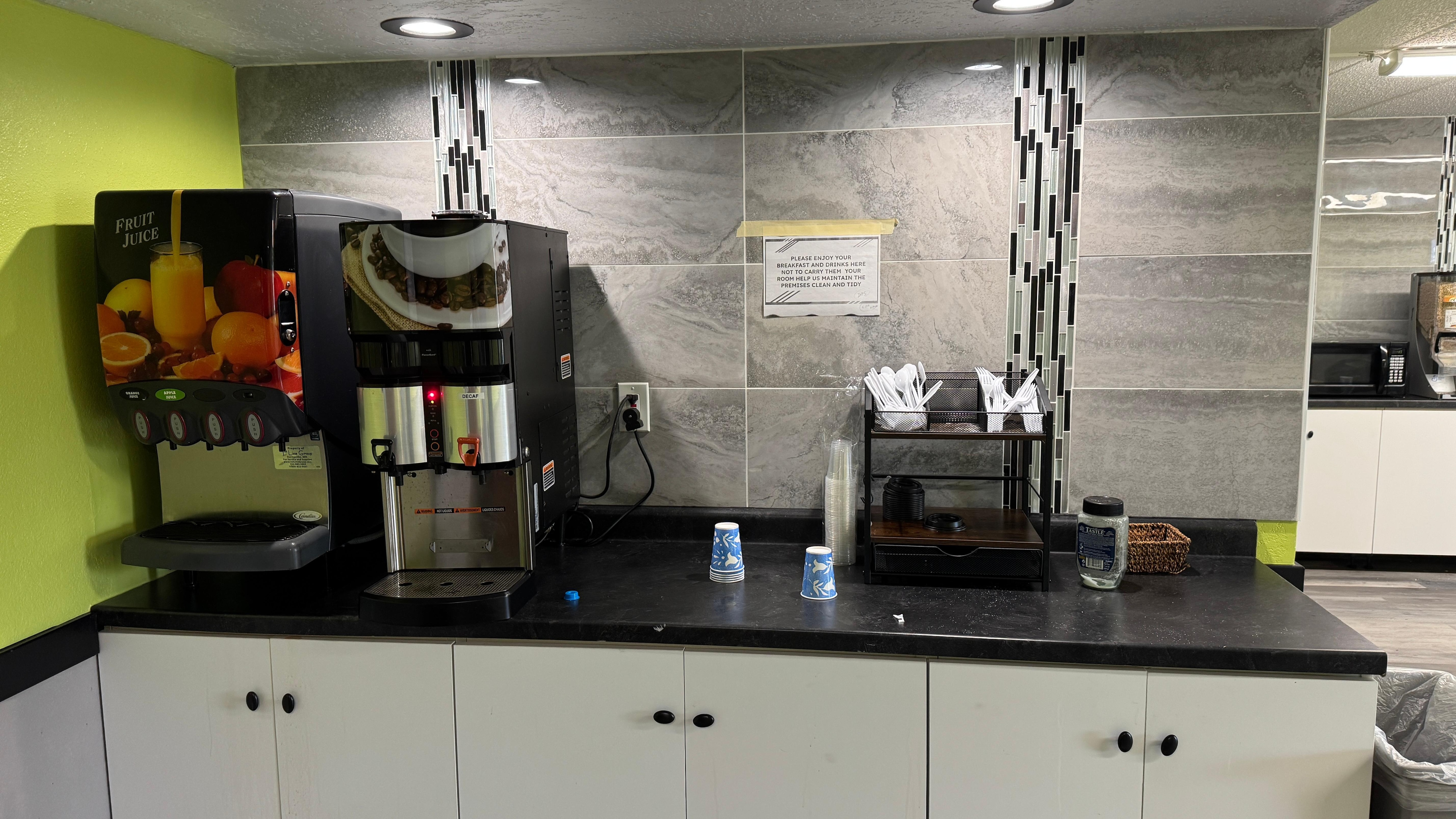Notice empty sugar jar. Orange juice machine was working but coffee yet though