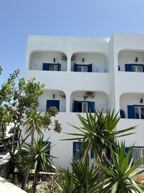 Looking up to some rooms from pool deck.