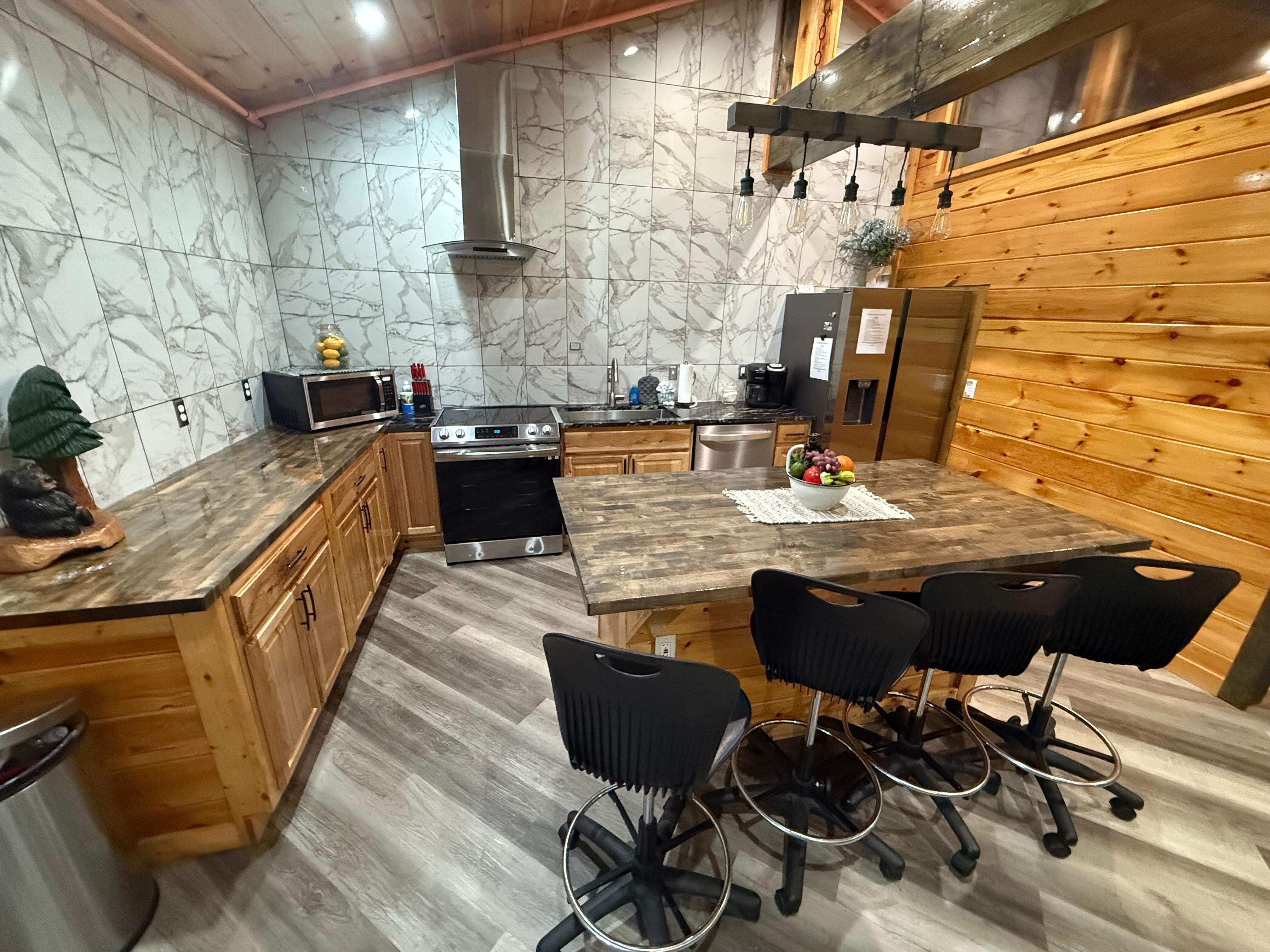 Open nice kitchen, looks well maintained if it isnt newly built.