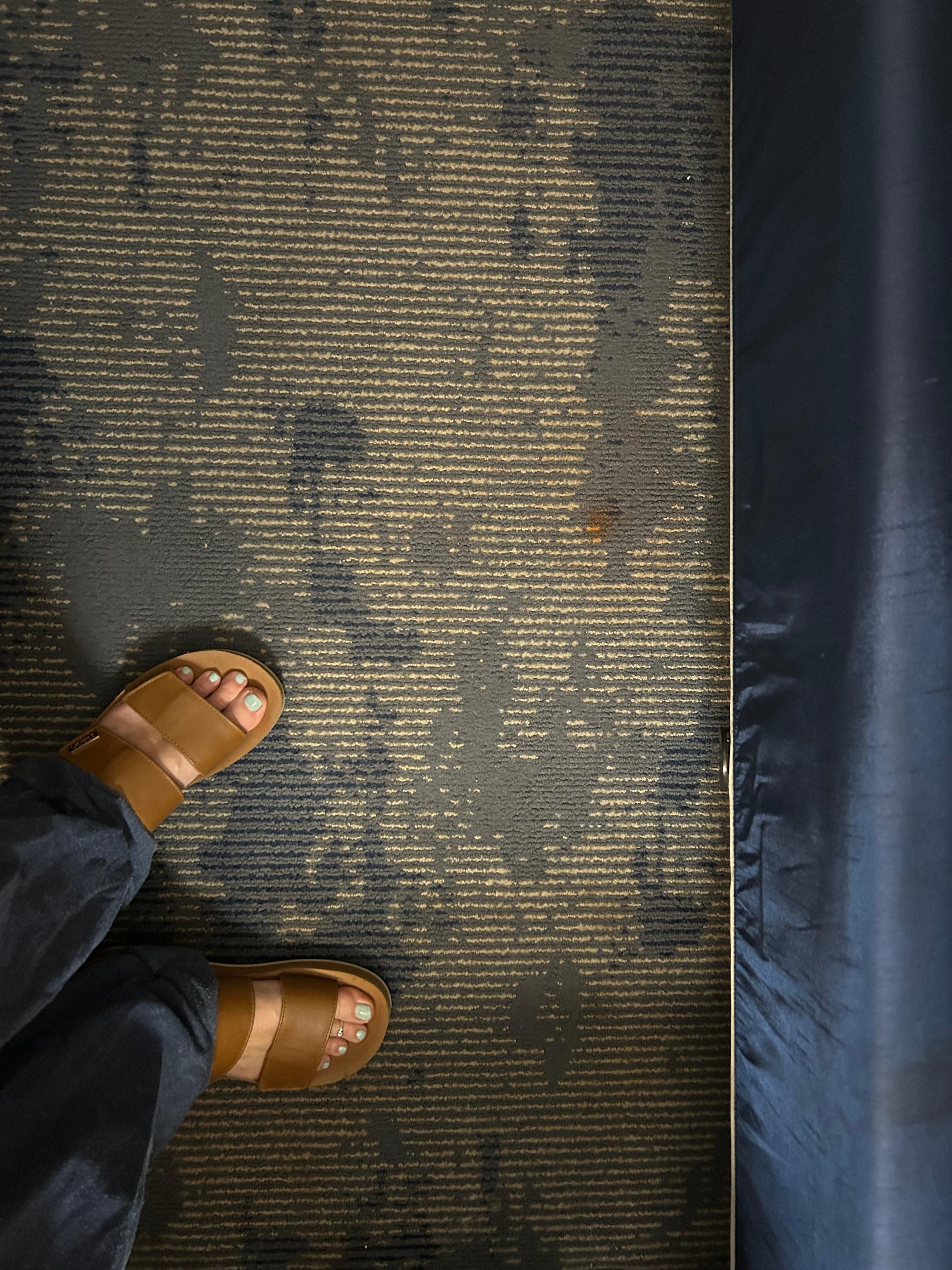 Stain by the bed.