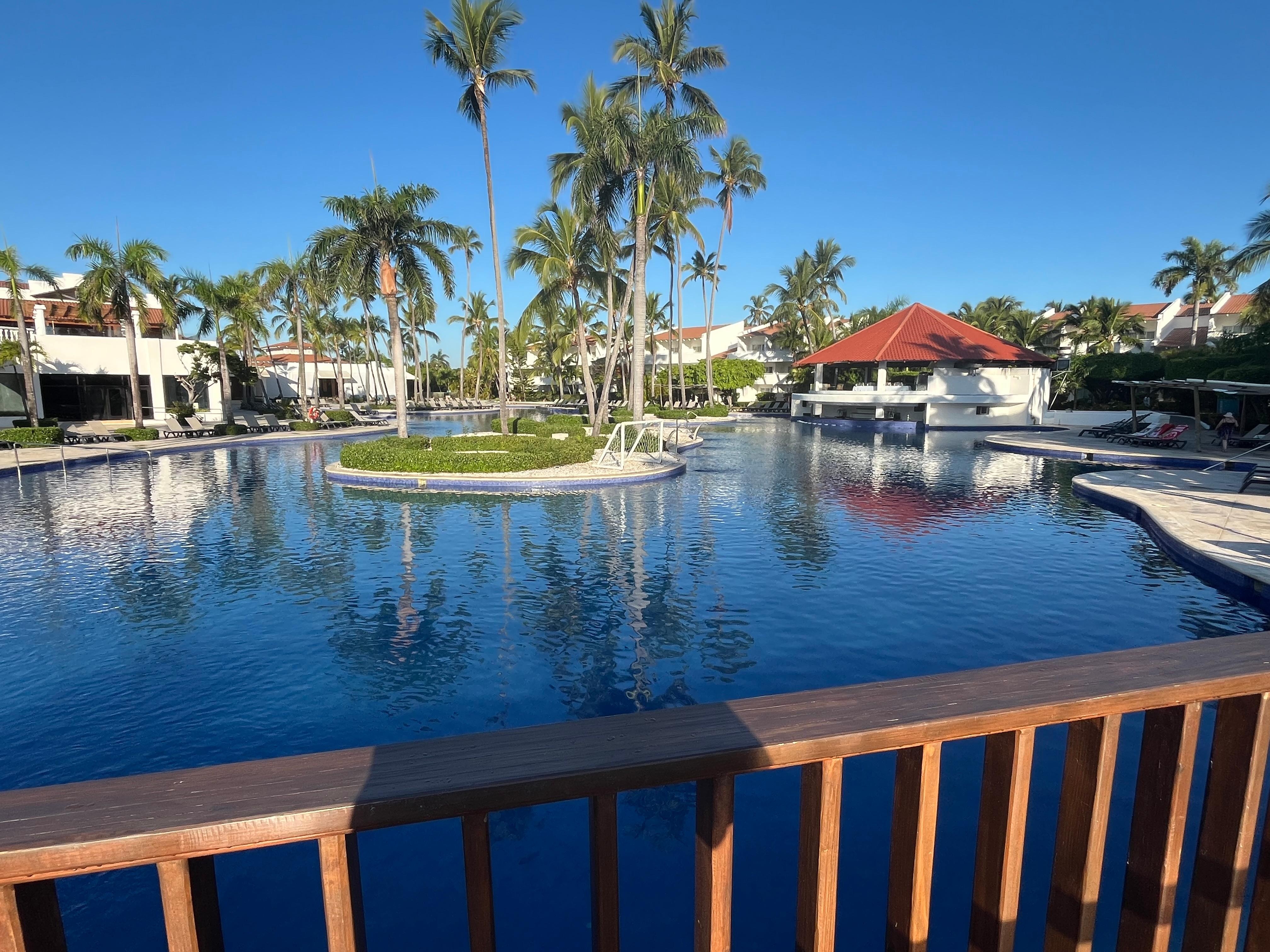 Main pool, snack shack with pool bar shown at right side