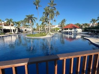 Main pool, snack shack with pool bar shown at right side