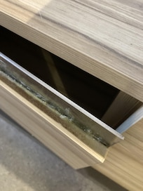 Finger groove (thick in dust) in fridge cupboard door in our room, Novotel York