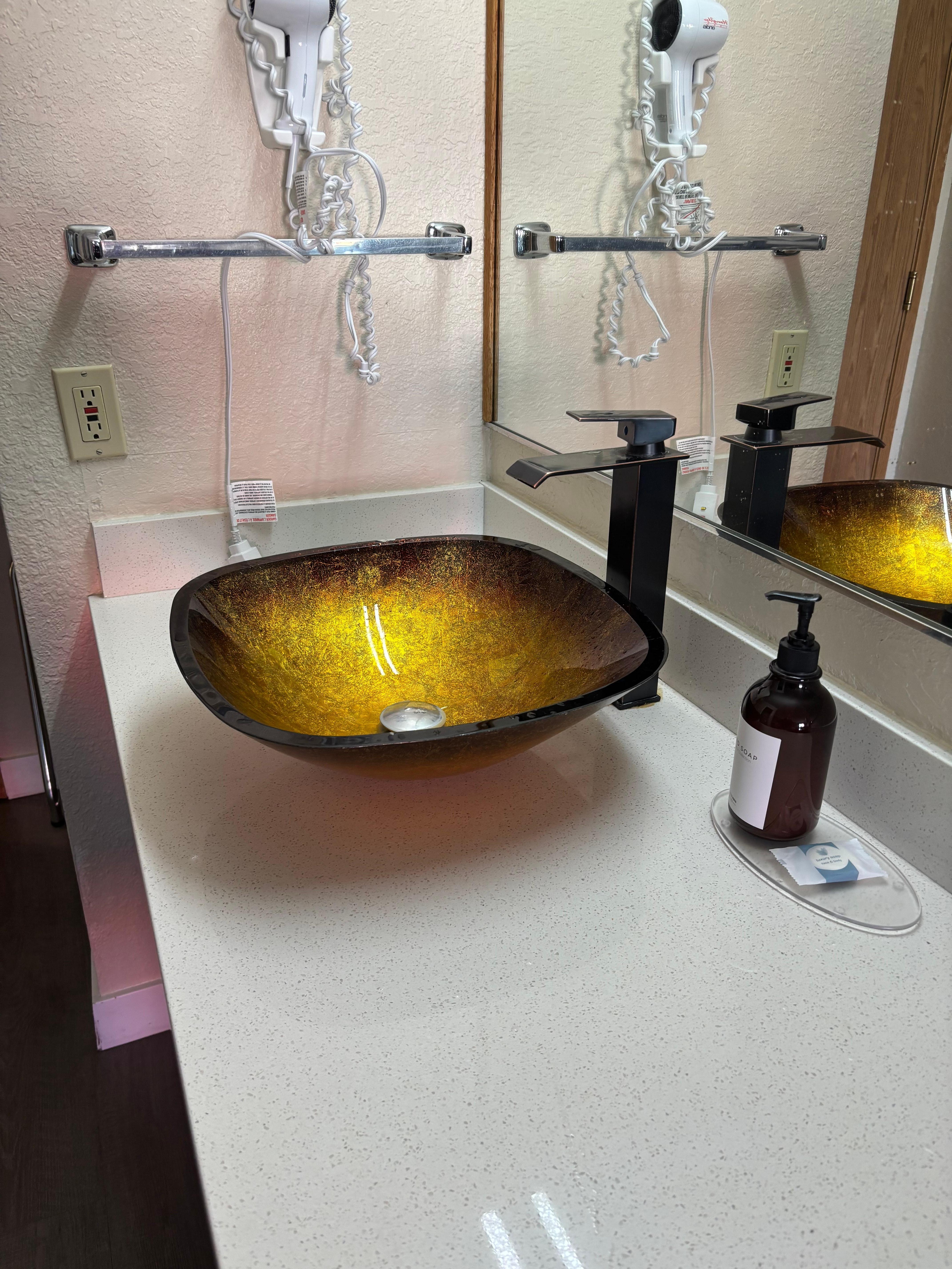 Very nice sink and soap amenities. 