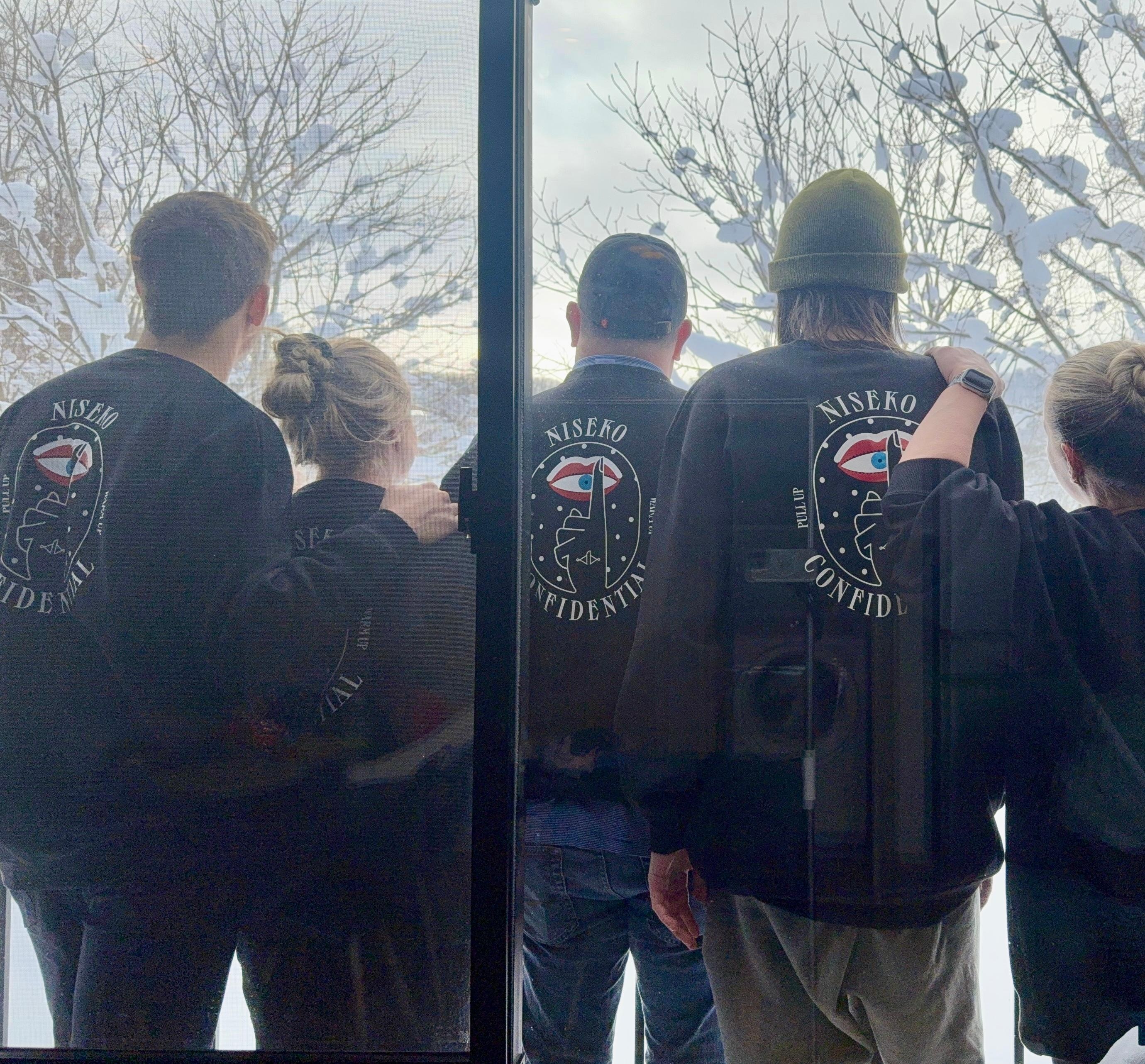 Family pic out on the balcony.