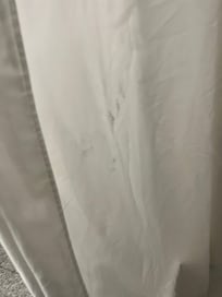 Stained shower curtain