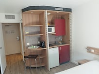 Room with a kitchenette.
