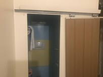 Porte coulissante cassée