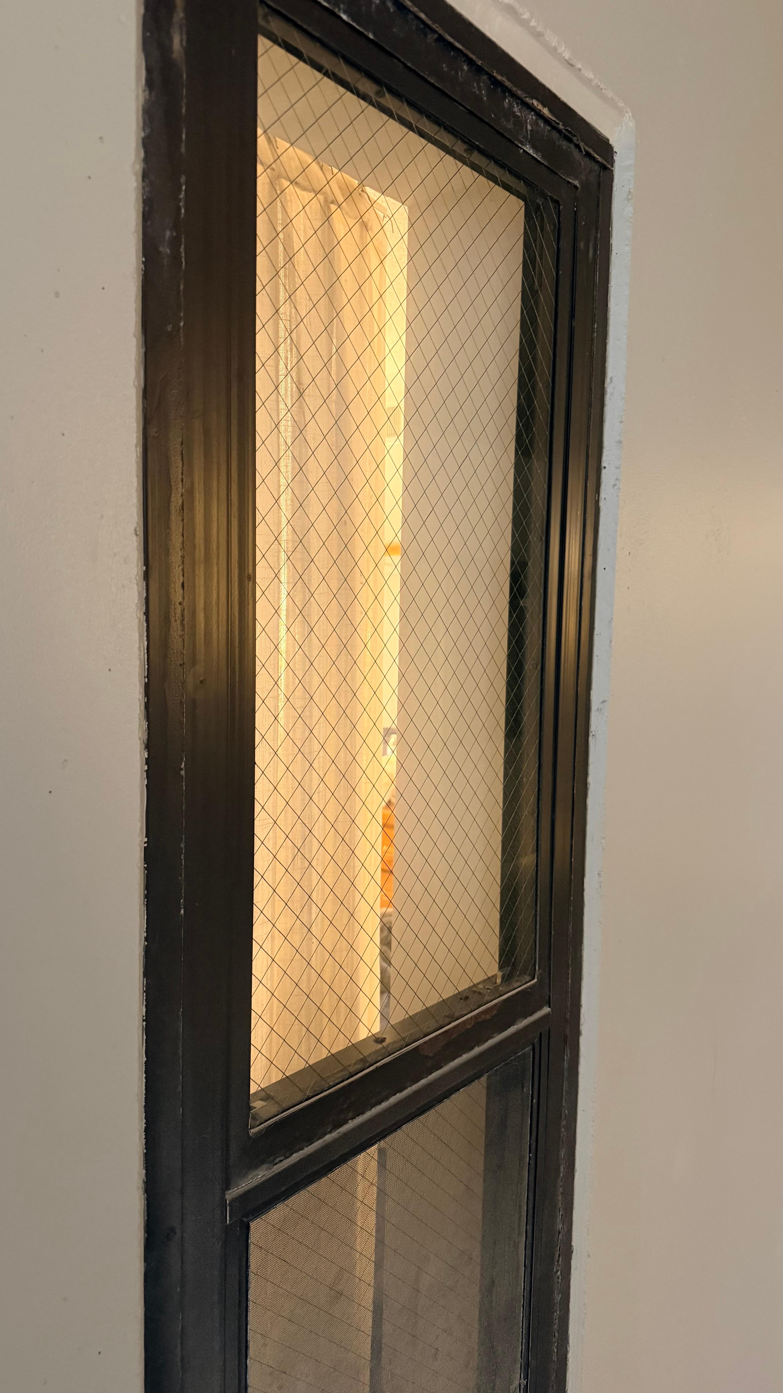 You can clearly see in the bedroom between the curtain and the wall too.