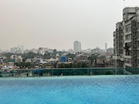 Small pool with a few beds