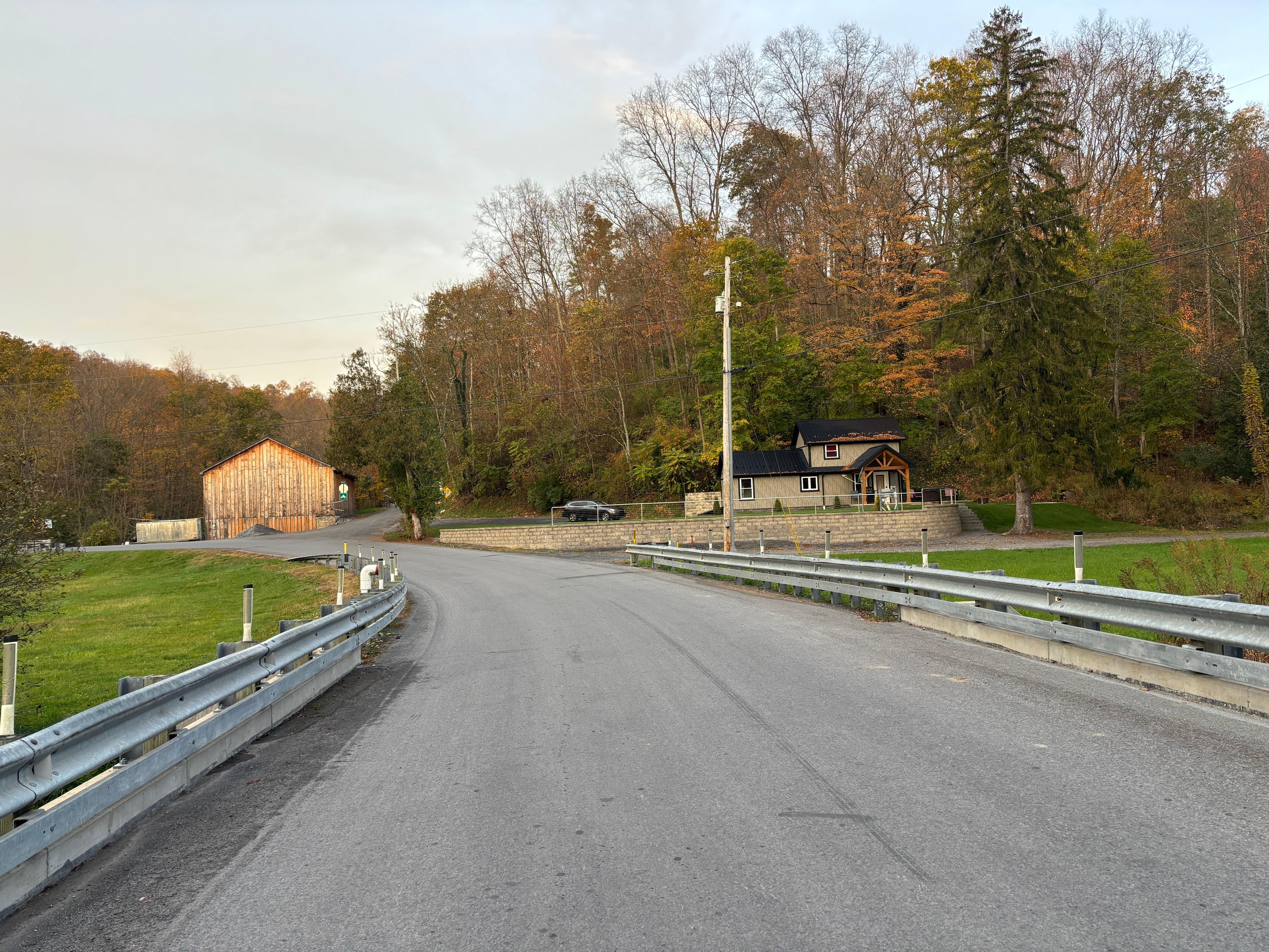 Looking back from across the street by the creek
