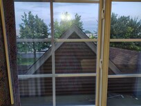 The view from my room was of the roof over the front entryway. Nice, guess I didn't need to close my curtains.