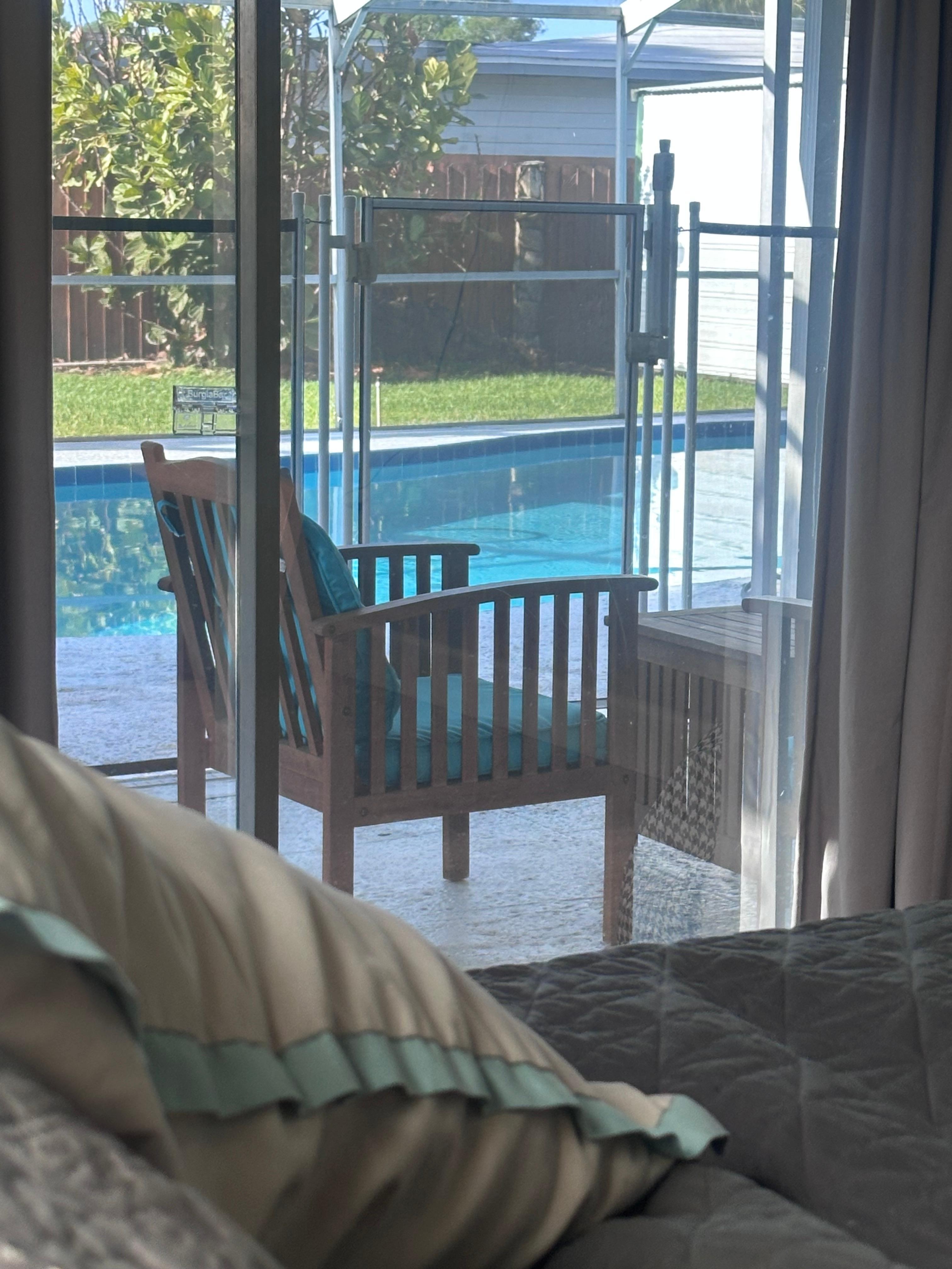 View from bedroom along the pool deck.